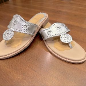 Jack Rogers silver flip-flop. Size 8.5. Never worn. Has a Foot Petal insert.